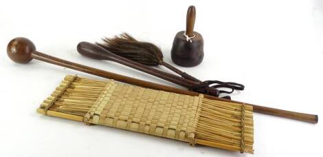 A late 19th/early 20thC African tribal knobkerry, with tapering handle, 88cm L, African hardwood club or cosh 48cm L, and various African artifacts, to include a small hard wood mallet, with later handle, a fly whip and a musical instrument probably 1920'