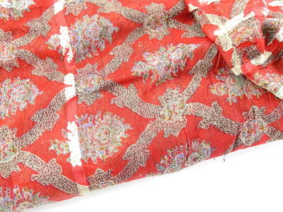 An Indian silk shawl, with designs of flowers within stylised lozenge shaped cells, on a red ground. (AF) - 2