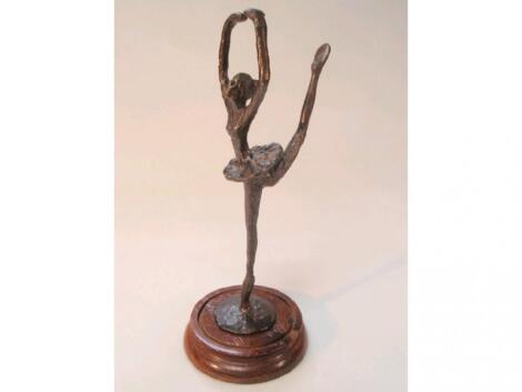 A modern bronze figure of a ballerina