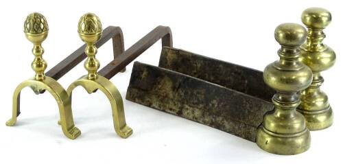 Two pairs of French brass and iron fire dogs or andirons, to include a pair with pineapple type finials, 22cm H.