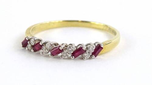 An 18ct gold diamond and ruby half hoop eternity ring, set with baguette cut ruby's and tiny diamonds, each in claw platinum setting, on an 18ct gold band, 2.6g all in, in CW box.