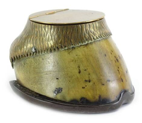 A late 19th/early 20thC horse hoof inkwell, with brass mount, 13cm deep