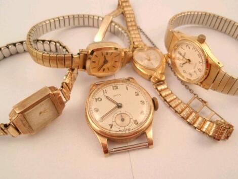 A gentleman's engraved 9ct presentation watch head and four ladies watches