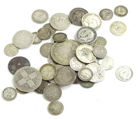 A quantity of pre 1946 silver coins, to include six pences, shillings and two shillings.