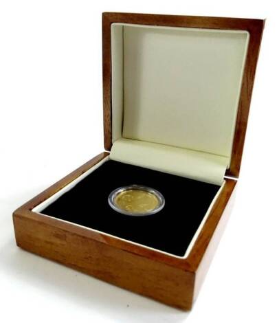 A 22ct gold Tristan Da Cuhna Trafalgar guinea, in original box with certificate.