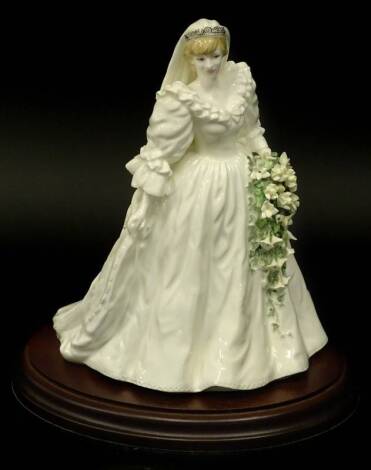 A Coalport Diana Princess of Wales figure, limited edition number 6155 of 12500, on wooden stand, 28cm H, with paperwork.