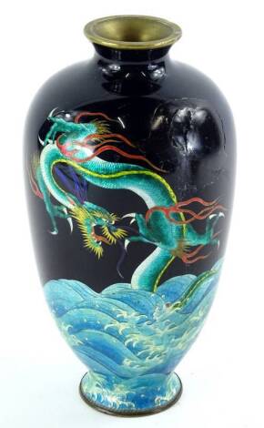 A 20thC Chinese silvered cloisonne vase, of shouldered form, decorated with dragon and waves, predominantly in green, yellow and blue on a black ground, (AF), 23cm H.