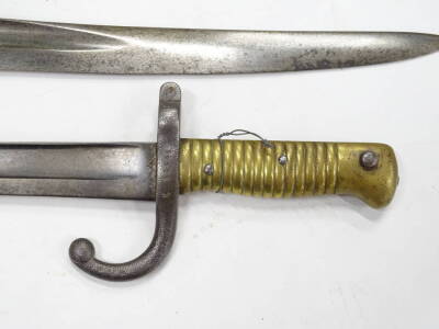 Two French Bayonets, each with a shaped blade, brass or steel handle, dated 1879-1. - 2