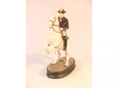 A Beswick equestrian figure group of a Lipizzaner of the Spanish Riding School