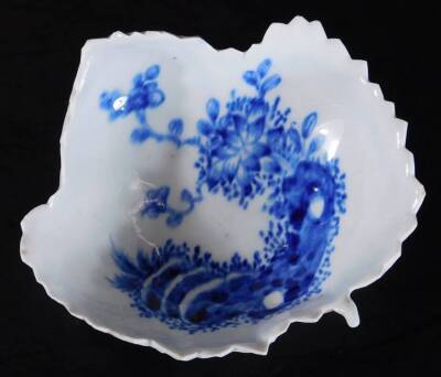 A mid 18thC Vauxhall porcelain pickle leaf dish, painted in blue and white with an oriental landscape, supported on three feet, c1755, 95cm W. - 2