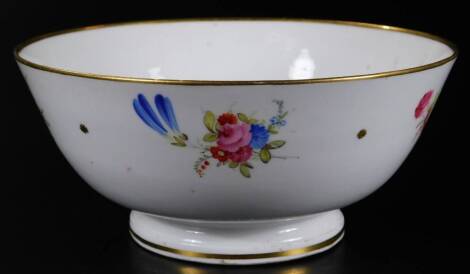 An early 19thC Swansea porcelain bowl, handpainted with flowers, with gilt stars, unmarked, c.1815, 16cm dia.