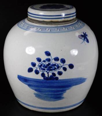 An 18thC Chinese blue and white porcelain ginger jar and cover, the circular body profusely decorated with insects and flowers, 24cm high. - 2