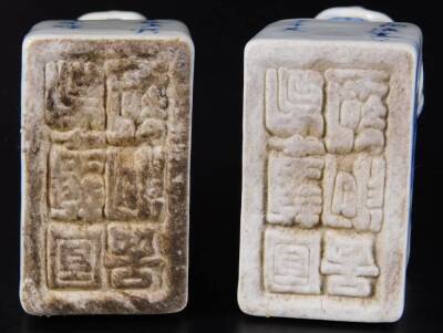 A pair of 20thC blue and white porcelain dog of fo seals, each decorated with figures and pagoda, with script to the front, with seal marks, 11cm H. (2) - 3