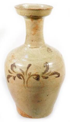 A Korean Koryo pottery vase, with compressed stem and shouldered circular body, decorated sparsely with flowers in green and brown glazes, on circular foot, 29cm H.