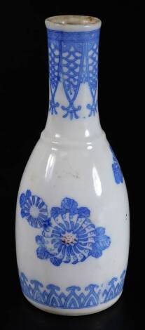 An early 20thC oriental blue and white vase, of shouldered circular form outline with cylindrical stem, the body picked out with flowers with a lower repeat banding, six character mark beneath, 17cm H.