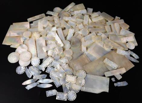 Various 19thC mother of pearl gaming counters, pieces, seals, etc. of various forms, to include rectangular examples set with a repeat scroll pattern, 7cm W, various others, etc., some later. (a quantity)