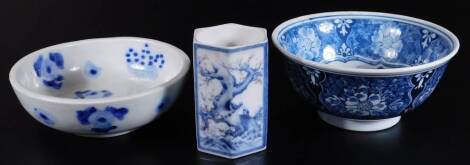 Various 20thC oriental ceramics, comprising of a Japanese blue and white bowl of circular form, decorated with flowers, two character mark beneath, 15cm Dia., a late 20thC vase and a small blue and white bowl decorated with flowers, on a partially unglaze