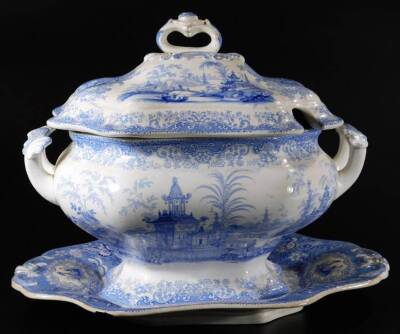 A 19thC Chinese blue and white pottery tureen, printed with oriental inspired landscape, with a cover and stand, c1860, marked CHIANG NAN CHINA, 28cm H. - 2