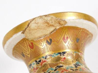 A 19thC Japanese satsuma pottery vase by Hattori Zo of octagonal form with an inverted cylindrical stem, profusely decorated with figures, with gilt highlights, on a circular foot, 17cm H, and a similar two handled koro, each marked beneath. (2) - 8