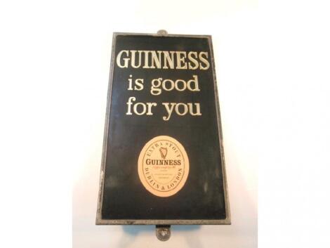 A vintage Guinness pub sign