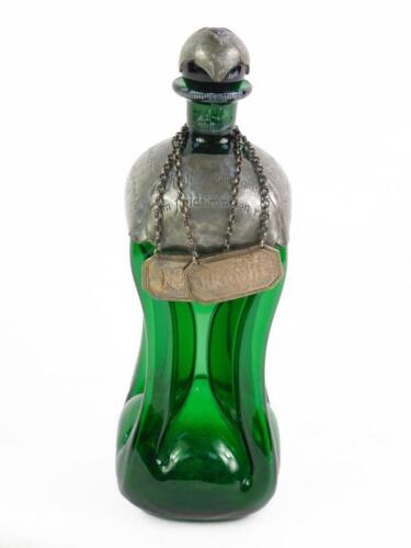 A Norwegian green hour glass decanter