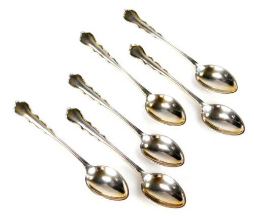 A set of six George V silver teaspoons, with shaped ends and plain bowls, London 1920, 10cm W, 2oz.