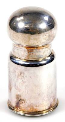 An Edwardian silver and green glass perfume bottle, with removable orb lid and glass stopper, Chester 1903, 9cm H.