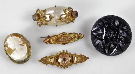 Various bar brooches, to include two Victorian bar brooches, one 9ct set with ruby and white stones, the other marked 9ct, with filigree scroll design, a cameo brooch with silver plated frame and two other costume brooches. (5)