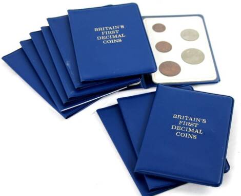 Ten Britain's First Decimal Coin set pouches, each complete. (10)