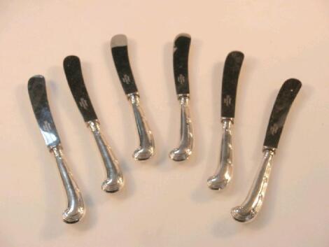 A set of six Edward VII silver handled dessert knives with reeded pistol grips