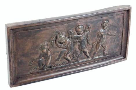 A 20thC plaque, of rectangular form raised with cherubs and garlands, resin, 27cm W.