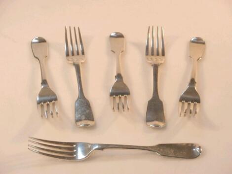 A set of six Victorian silver fiddle pattern dessert forks