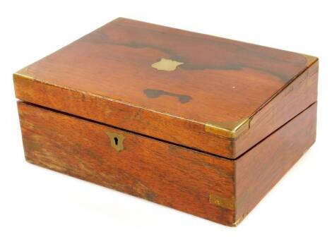 A 19thC rosewood writing slope, with brass spandrels, central vacant cartouche and fitted interior, 12cm H, 29cm W, 24cm D.