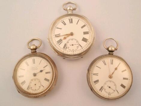 Three open faced silver pocket watches