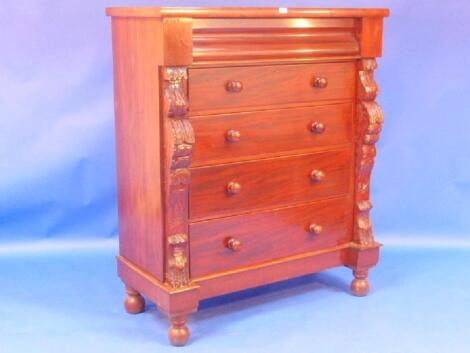 A Victorian mahogany Scotch chest of five drawers with knop handles and turned feet