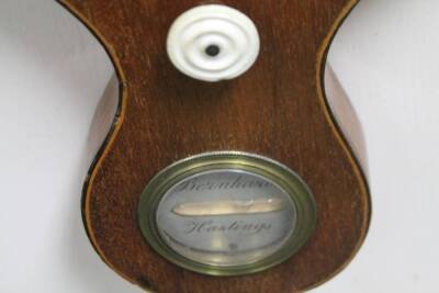 A 19thC mahogany five dial banjo barometer, signed Bernhard Hastings, with dry/damp feature, thermometer, bull's eye glass and 19cm silvered dial, in a broken swan neck pedimented case surmounted by a metal urn finial, 97cm H. - 3