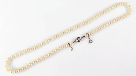 A Majorca faux pearl necklace, with silver clasp and safety chain, inset with cultured pearls, 51cm L overall.