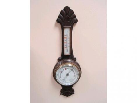 A late Victorian aneroid wheel barometer