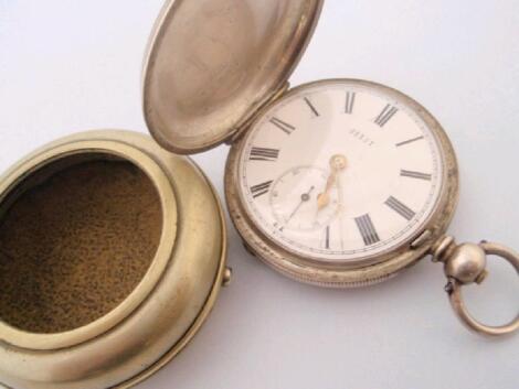 A full hunter pocket watch in white metal