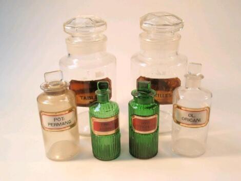 Two large antique glass chemist jars with stoppers for tablets and pastels