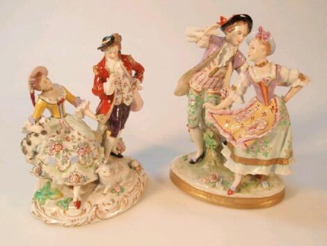 A 20thC Sitzendorf figure group of a dancing couple in 18thC dress