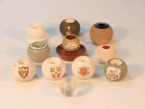 Eleven assorted match striker stoneware globes