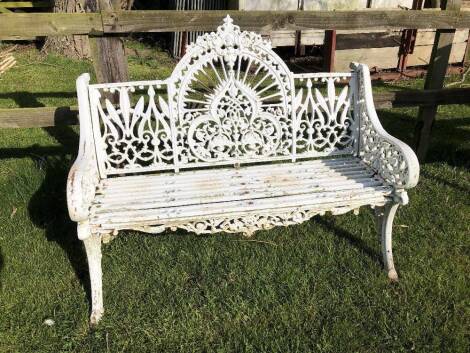 A cast iron garden bench.