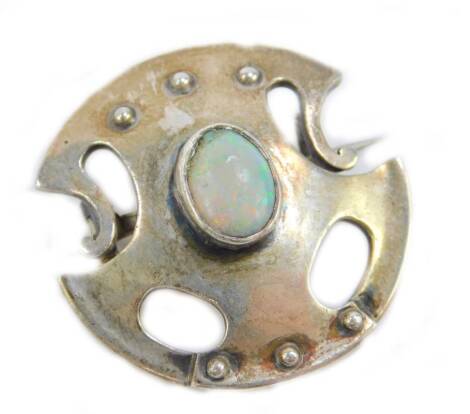 A Murrle Bennett opal set brooch, in white metal, of scrolling shield form, stamped M B & Co 950, 6.3g.