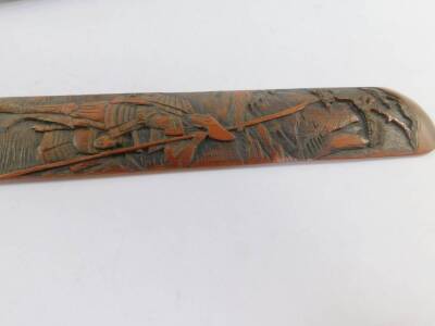 A Japanese Meiji period bamboo walking stick, the knop carved with mushrooms and leaves, above a shaft carved in bas relief with birds and chrysanthemums, 19.5cm L, together with a bamboo page turner, carved with Samurai Warriors, 51cm L. (2) - 4