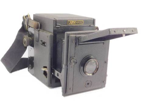 An Apem Reflex box camera, with a Cooke-Apen Anasticmat lens No 91552.