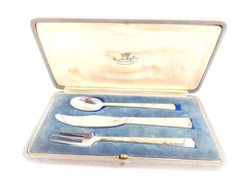 A George VI silver knife fork and spoon set, with textured decoration, cased, Charles Boyton, London 1938, 4.03oz.