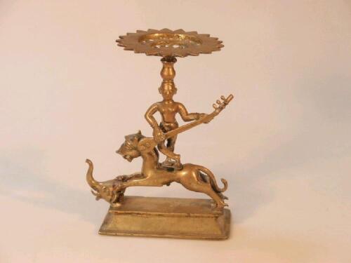 An Indian bronze musician figure pedestal