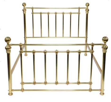 A Victorian style brass double bed, with side irons.