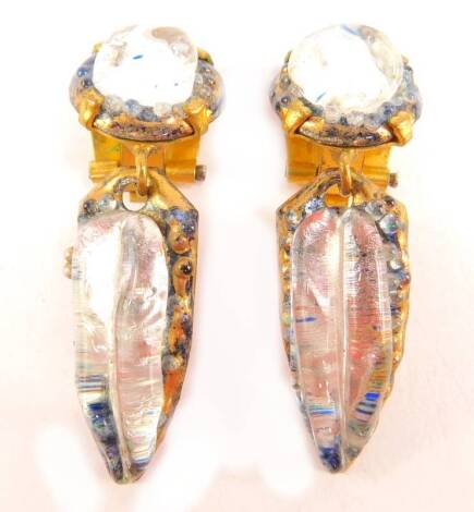 A pair of French clip-on earrings, with pink enamel backs, and crystal set fronts, in copper design, each earring 4.5cm high.